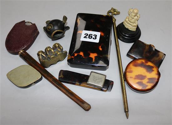 A box of tortoiseshell collectables